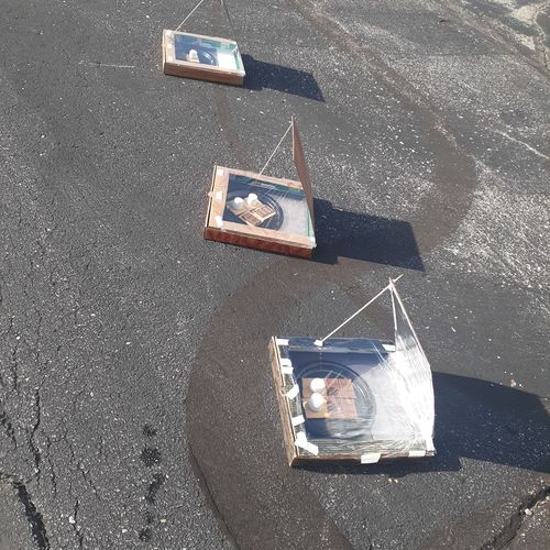 Children-made solar ovens.